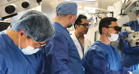Neurosurgeons and doctors preparing for an examination or a procedure. 